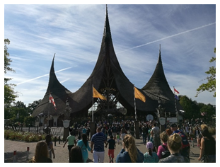 A group of people standing in front of a crowd

Description generated with high confidence